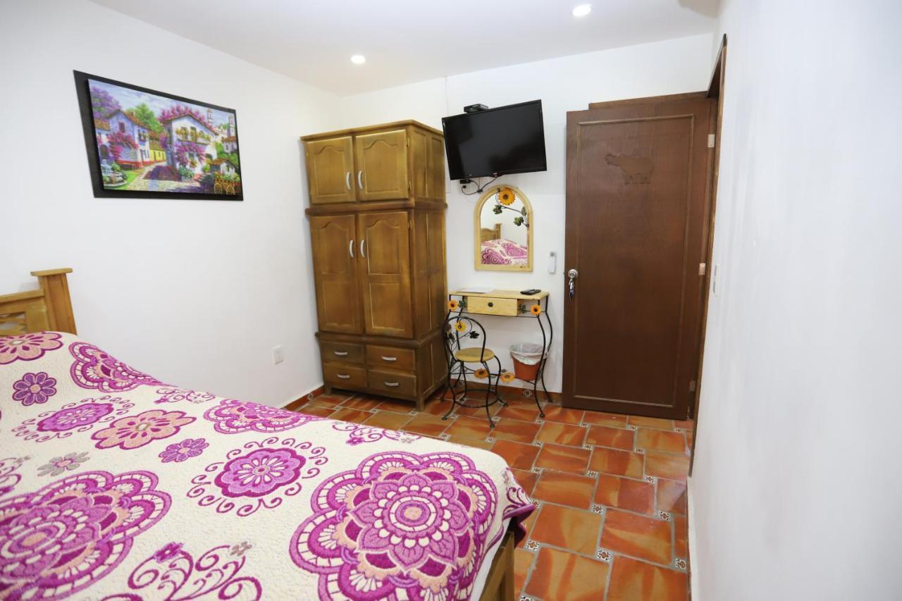 Quarto Duplo com 2 Camas de Casal