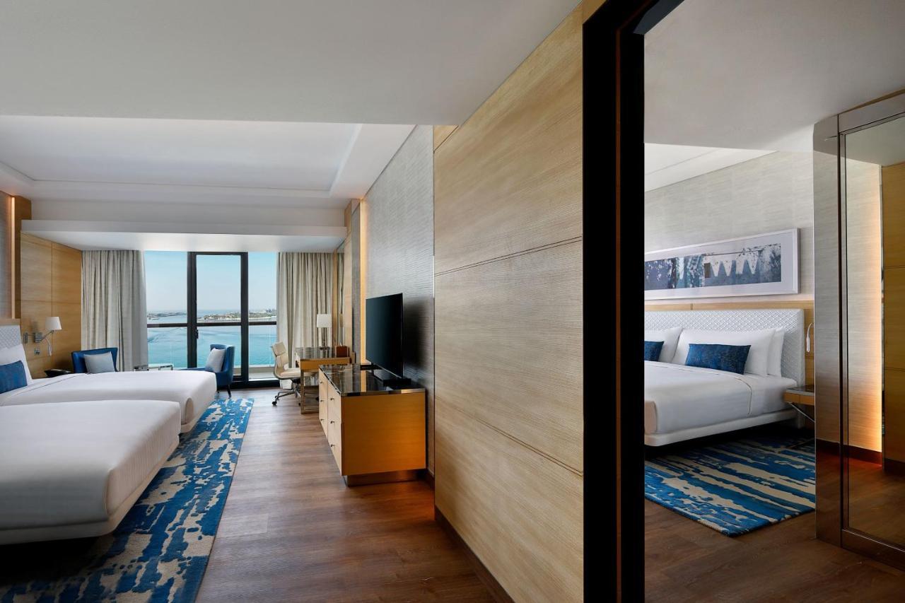 Palm Familienzimmer mit Meerblick, angrenzendes Zimmer, eigener Balkon, Meerseite im Resort