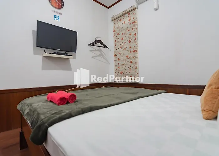 Langkar Guest House Syariah Mitra Reddoorz