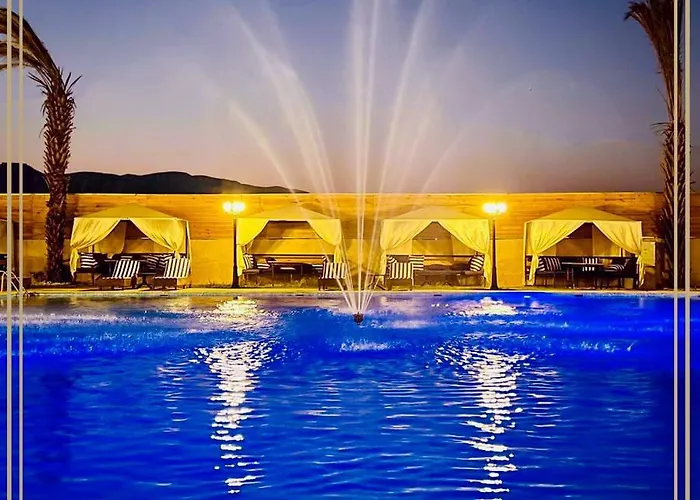 Qasr Alnkheel Resort And Hotel