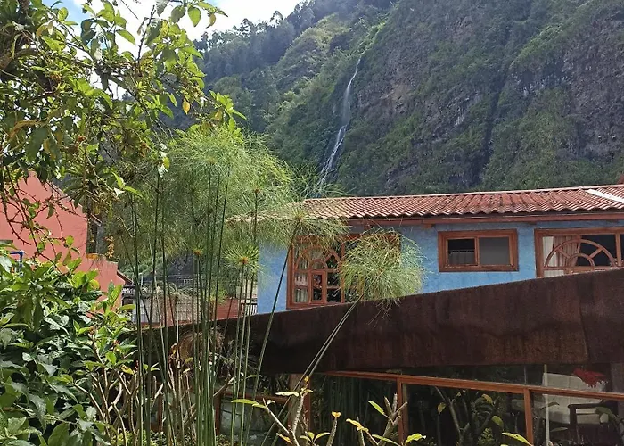 Posada J