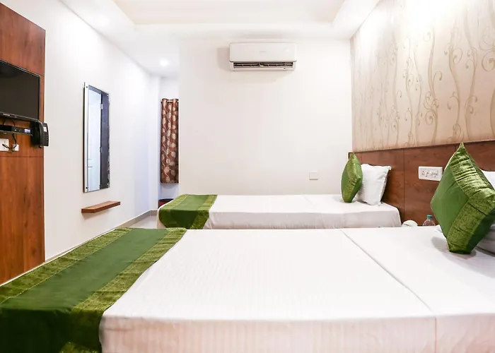 Treebo Comforts Inn, University Road Deralakatte