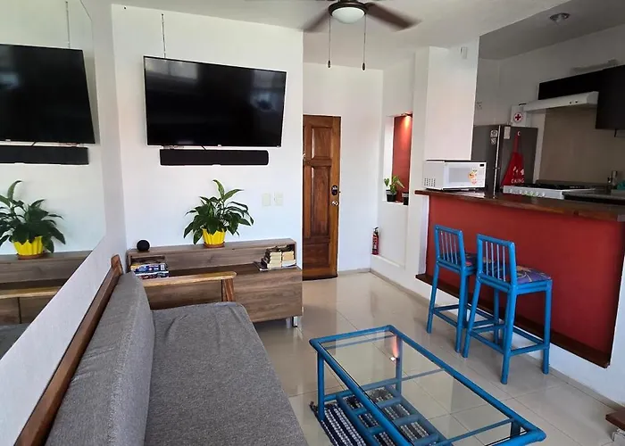 Magnifico Departamento: Beachfront Oasis with Pools and Comfort for 6