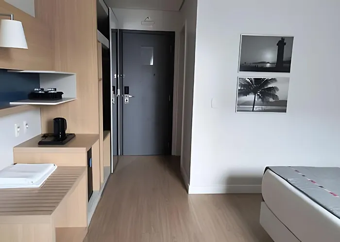 Suíte em flat no Gonzaga Stay Helbor