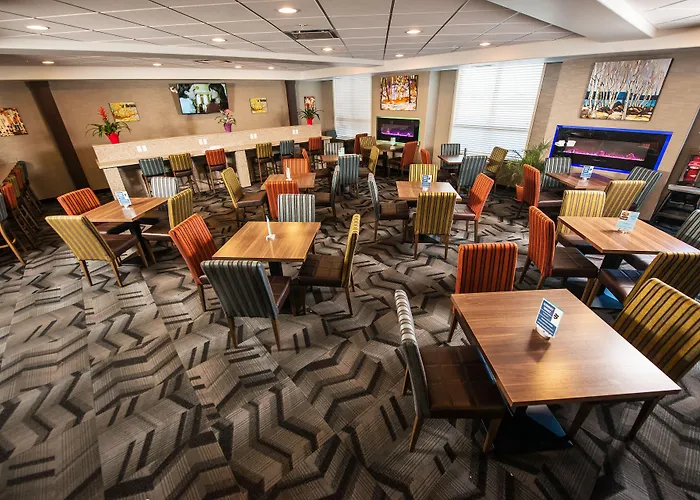 Encore Suites By Service Plus Inns