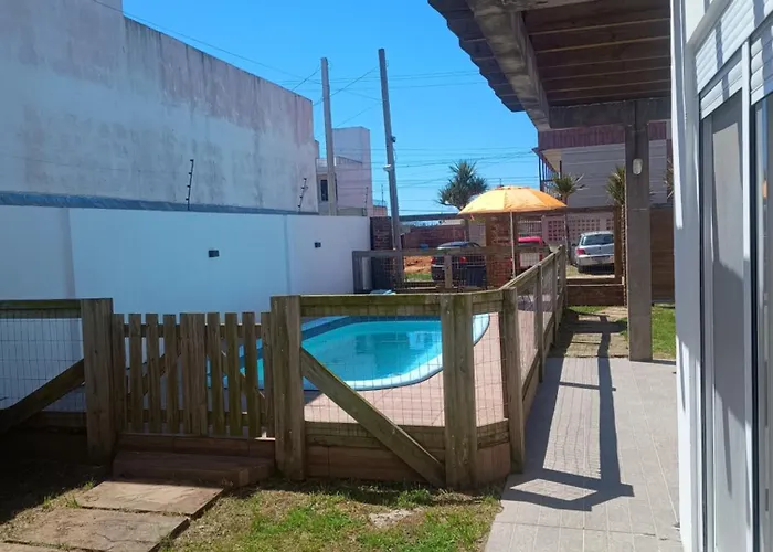 Casa TOP no cassino, piscina grande 5 min da praia e churrasqueira coberta