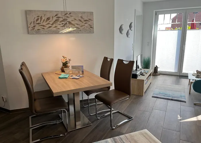 Inselparadies - Neubauwohnung mit großer Terrasse, Strandkorb und Garten.