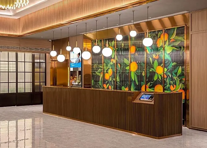 Orange Hotel Changde Railway Station Happy Town