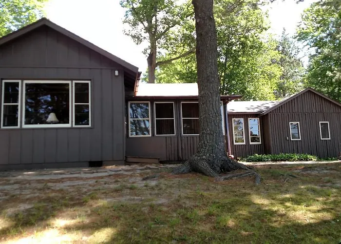 Log Cottage On Blue Lake